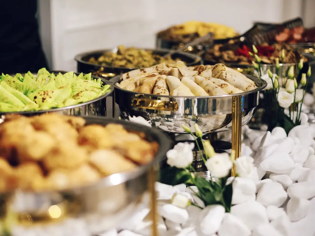 Master Chefs preparing food in kitchen